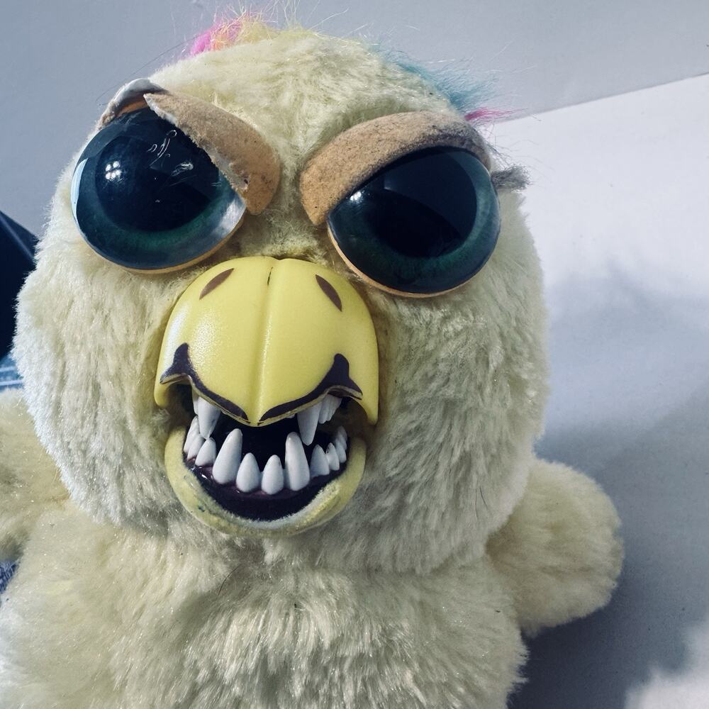 Feisty Pets Treacherous Travis the Rainbow Chick Fangs funny plush gag